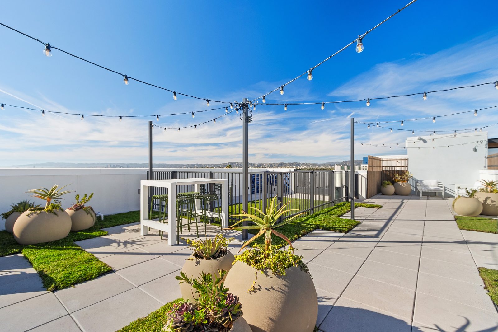 Rooftop sky deck and resort-style pool at Tessera, a six-minute walk from USC.